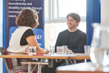 A man and a woman are having a one-to-one coaching session.