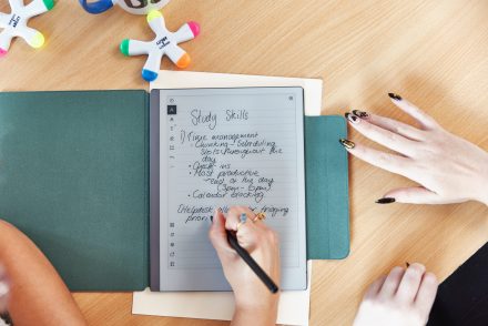 Two people (off camera) use a remarkable tablet to make notes during a study skills session. 