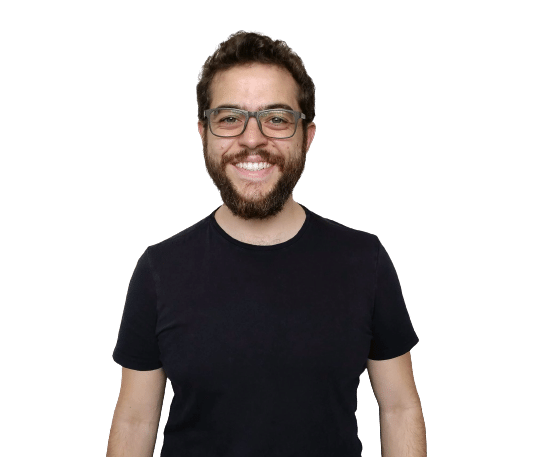 Photo of Heitor, a white man with short brown hair, a full beard and glasses, wearing a black shirt and smiling