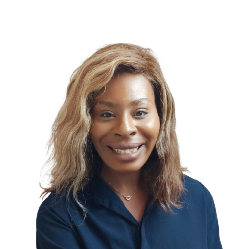 A smiling black woman who has shoulder-length blonde hair and is wearing a navy blue top.